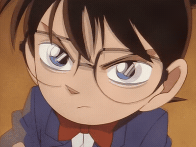 A Cartoon Character With Glasses And A Bow Tie GIF