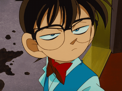 A Cartoon Character With Glasses And A Red Bow Tie Making A Funny Face GIF