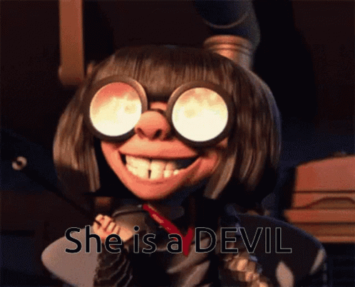 A Cartoon Character With Glasses And The Words She Is A Devil Behind Her GIF