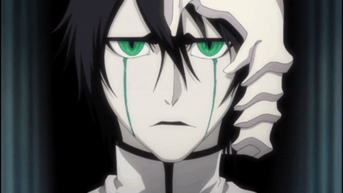 A Cartoon Character With Green Eyes And Tears On His Face GIF