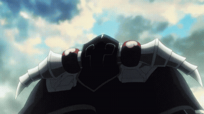 A Cartoon Character With Horns And A Shield With The Letter T On It GIF