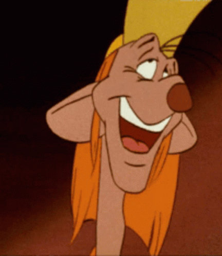 A Cartoon Character With Long Orange Hair And A Yellow Hat Is Smiling GIF