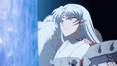 A Cartoon Character With Long White Hair And A Crescent Moon On His Forehead GIF