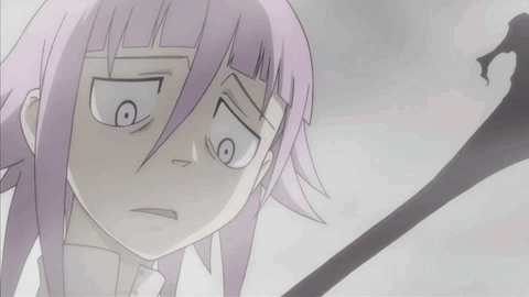 A Cartoon Character With Purple Hair And A White Shirt Making A Funny Face GIF