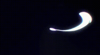 A Cartoon Character With Purple Hair And Red Eyes Waving Her Hand GIF