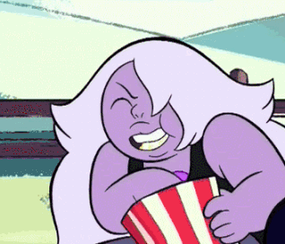 A Cartoon Character With Purple Hair Is Eating Popcorn GIF