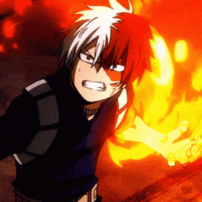 A Cartoon Character With Red And White Hair Is Holding A Fireball In His Hand GIF