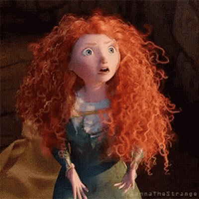 A Cartoon Character With Red Curly Hair And Blue Eyes Looks Surprised GIF