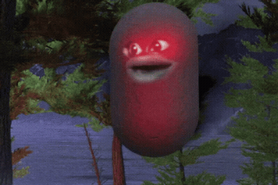 A Cartoon Character With Red Eyes And A Smile On Its Face GIF