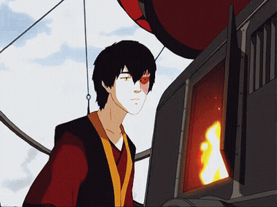 A Cartoon Character With Red Eyes Stands In Front Of A Fireplace GIF