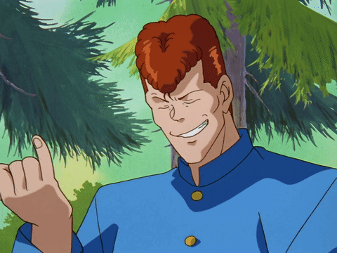 A Cartoon Character With Red Hair And A Blue Shirt Is Smiling And Giving The Middle Finger GIF