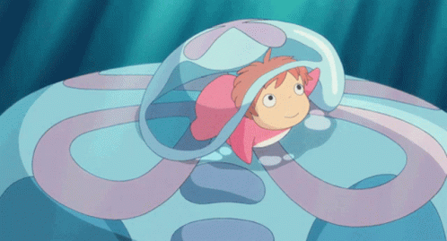 Red-Haired Girl Swimming With Pink Blanket GIF