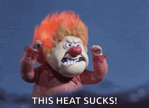 A Cartoon Character With Red Hair And A Red Nose Says This Heat Sucks . GIF