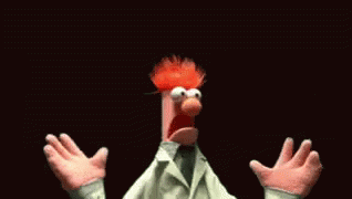 A Cartoon Character With Red Hair And A White Coat Is Making A Surprised Face GIF