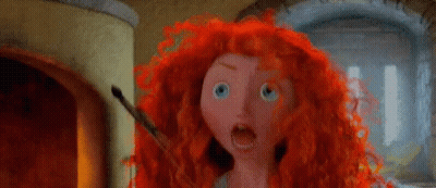 A Cartoon Character With Red Hair And Blue Eyes GIF