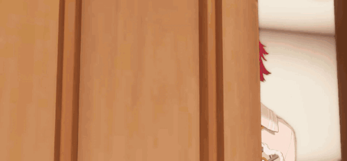 A Cartoon Character With Red Hair Is Standing In Front Of A Picture Of Himself Surrounded By Stars . GIF