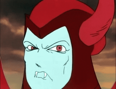 A Cartoon Character With Red Horns And A Blue Face Is Making An Angry Face GIF