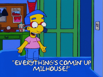A Cartoon Character With The Words Everything 'S Comin ' Up Milhouse GIF