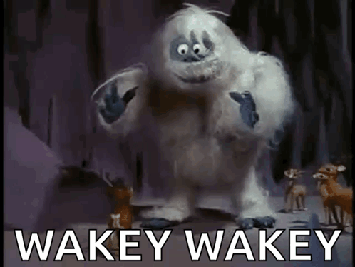 A Cartoon Character With The Words Wakey Wakey On The Bottom GIF