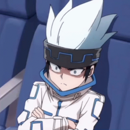 A Cartoon Character With White Hair Is Sitting In A Blue Chair GIF