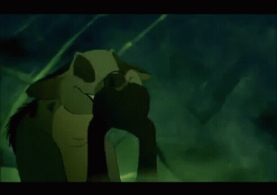 A Cartoon Character With Yellow Eyes And A Red Tongue Sticking Out GIF