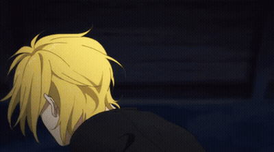 A Cartoon Character With Yellow Hair And A Black Jacket GIF