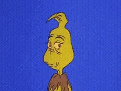 A Cartoon Character With Yellow Hair And Red Eyes Is Against A Blue Background GIF