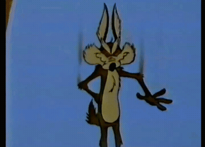 A Cartoon Coyote Is Holding A Book Titled The Basic Encyclopedia GIF