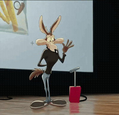 A Cartoon Coyote Is Standing In Front Of A Screen With A Plus Sign On It GIF