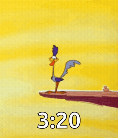 A Cartoon Coyote Is Standing On A Cliff With The Time 3:20 GIF