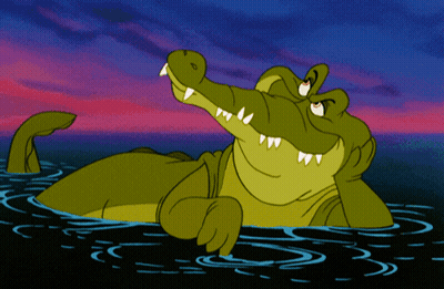 A Cartoon Crocodile Is Swimming In The Water With His Mouth Open GIF