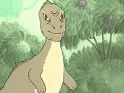 A Cartoon Dinosaur Is Standing In The Grass With A Serious Look On Its Face . GIF