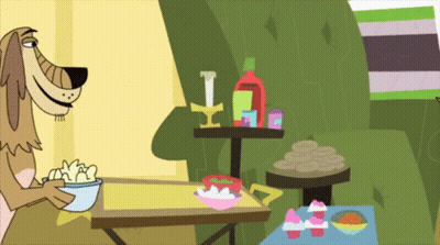A Cartoon Dog Is Holding A Bowl Of Popcorn While Sitting At A Table GIF