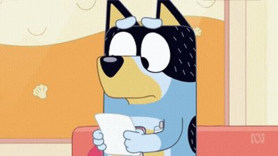 A Cartoon Dog Is Holding A Piece Of Paper And Looking At It . GIF