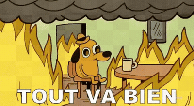 A Cartoon Dog Is Sitting At A Table With A Cup Of Coffee In Front Of A Burning House . GIF