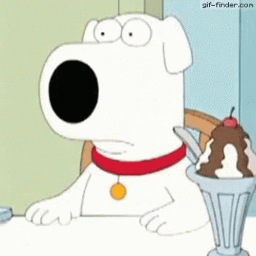 A Cartoon Dog Is Sitting At A Table With A Cup Of Ice Cream And A Spoon . GIF