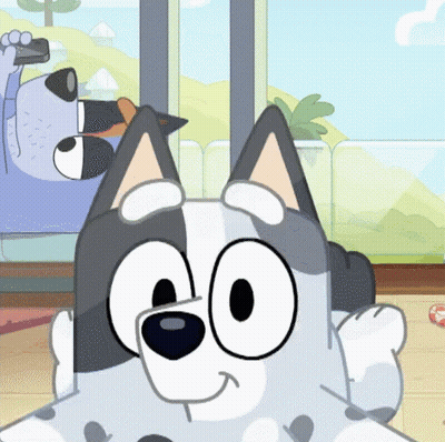 A Cartoon Dog Is Sitting On A Couch Looking At The Camera GIF