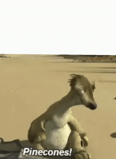 A Cartoon Dog Is Sitting On A Sandy Beach And Says Pinecones . GIF