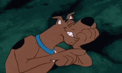 A Cartoon Dog With A Blue Collar Is Pointing At Something GIF