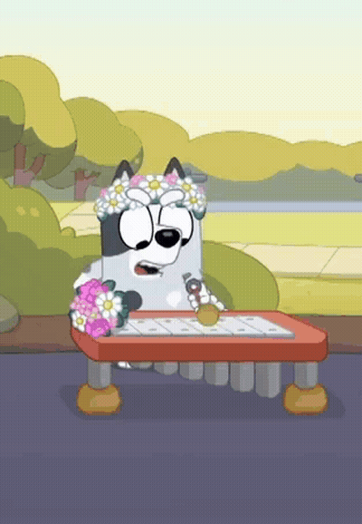 A Cartoon Dog With A Flower Crown On His Head GIF