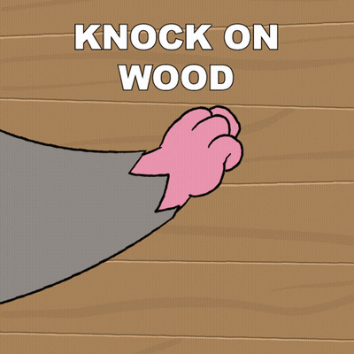 A Cartoon Drawing Of A Cat 'S Paw With The Words Knock On Wood Below It GIF