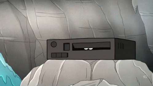 A Cartoon Drawing Of A Device With A Face On It GIF