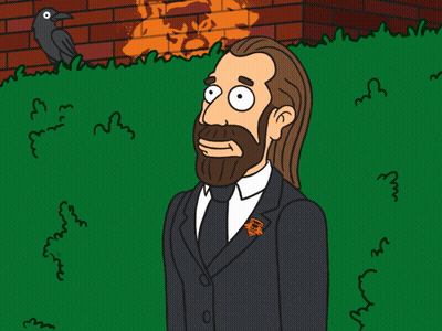 A Cartoon Drawing Of A Man With A Beard Wearing A Black Suit And Tie With An Orange Pin With The Letter R On It GIF