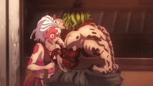 A Cartoon Drawing Of A Man With A Red Face And A Woman With White Hair GIF