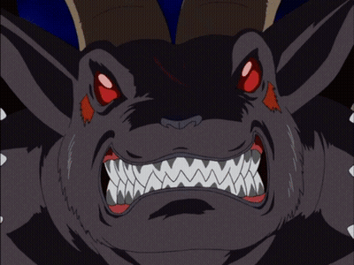 A Cartoon Drawing Of A Monster With Red Eyes GIF