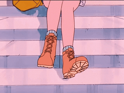 A Cartoon Drawing Of A Person 'S Feet Wearing A Pair Of Brown Boots GIF