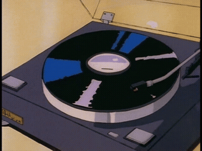 A Cartoon Drawing Of A Record Player With A Record On It GIF