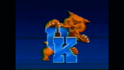A Cartoon Drawing Of A Tiger Holding A Letter K With Its Claws GIF