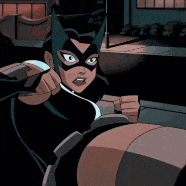 A Cartoon Drawing Of A Woman In A Cat Mask GIF