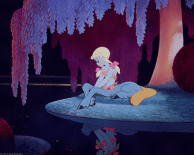 A Cartoon Drawing Of A Woman Sitting On A Pony With The Words Vintagegal Below It GIF